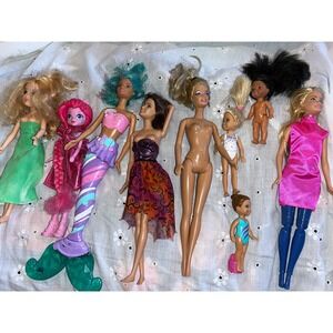 Various Barbies and other name brand doll lot